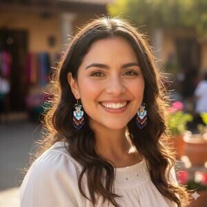 Mexican earrings Frida doll likeness  3.5 x 1.5 in